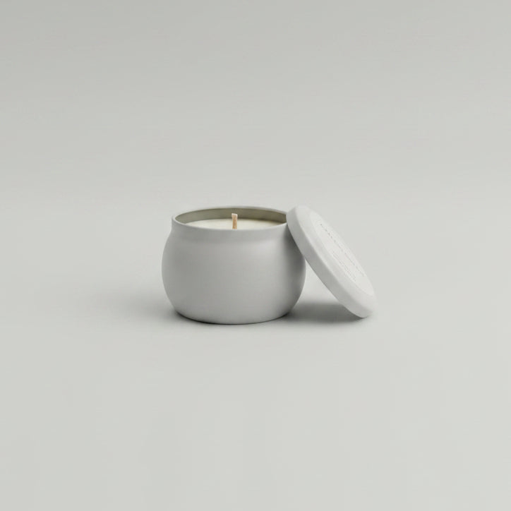 Scented candle white travel tin.
